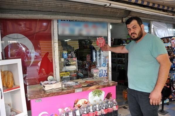 Türk bayrağı asılı marketi yakmak istemişler
