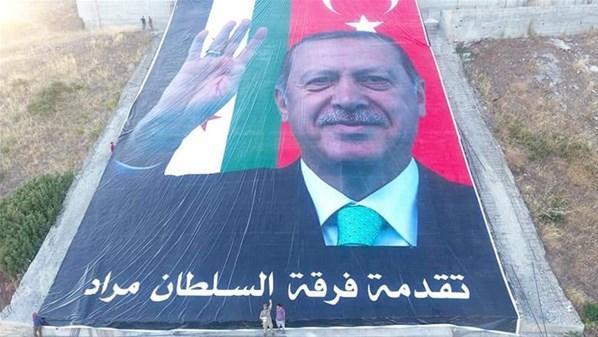 Afrinde Öcalan resminin imha edildiği alana dev Erdoğan posteri