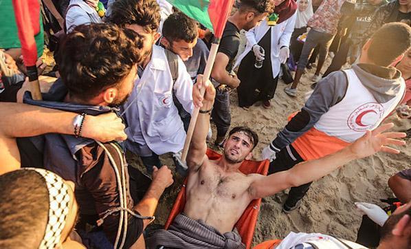 İsrail askerleri fotoğraftaki Filistinli genci hedef aldı
