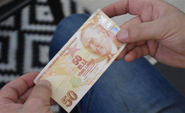 ATMden çektiği 50 lira baskı hatalı çıktı