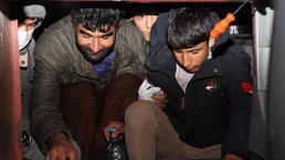 Otobüslerin gizli bölmelerinde yakalandılar! 47 kişi...