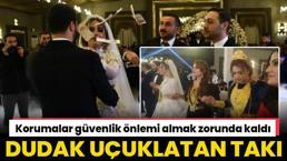 Düğünde dudak uçuklatan takı! Korumalarla güvenlik önlemi alındı