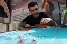 Pirinç tanesine 10 isim sığdırıyor! Keban'da tek nefeste icra edilen inanılmaz sanat