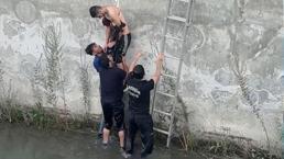 DSİ kanalına düşen genci arkadaşı yakaladı, itfaiye kurtardı