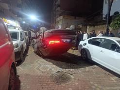 Park halindeki 6 araca çarpan otomobil takla attı