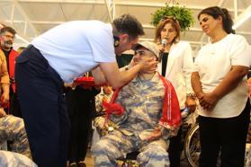 Engellilere asker kınası
