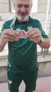 Bursaspor’un fanatik taraftarı takma dişinin damağına da kulüp amblemi yaptırdı