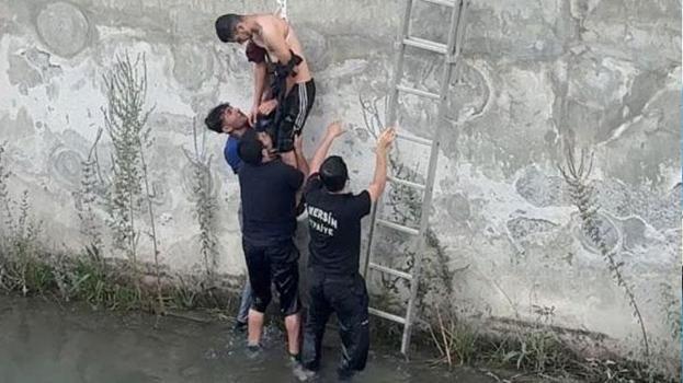 DSİ kanalına düşen genci arkadaşı yakaladı, itfaiye kurtardı