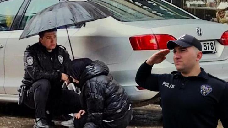 Yaralı öğrenciye ıslanmasın diye dakikalarca şemsiye tutan polis: Görevimizi yaptık