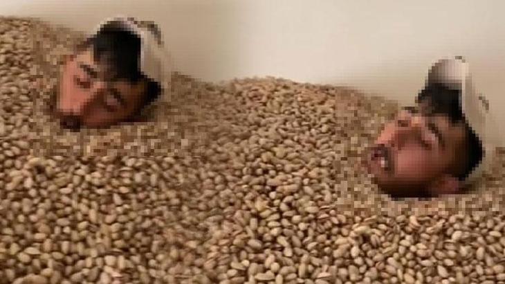 Sosyal medyadan paylaştı görüntüler tepki çekti! Üzerine tükürdüğü 2 ton fıstığa el konuldu