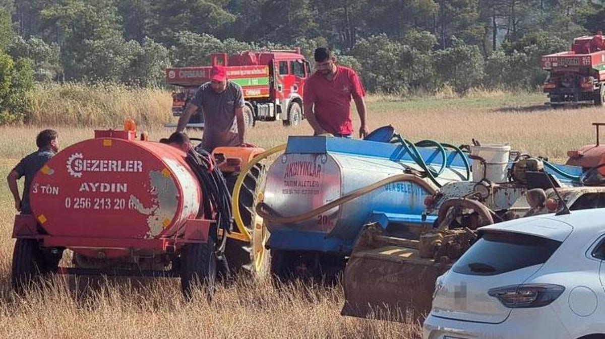Muğla'da orman yangınına müdahale eden helikopterler.
