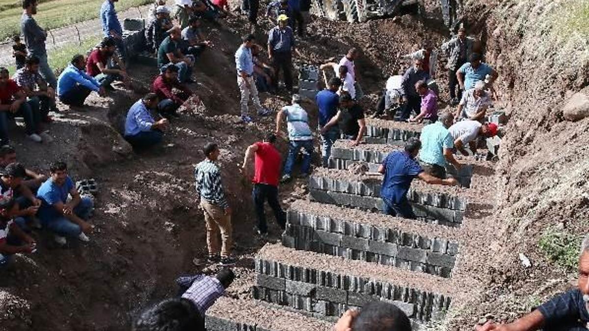 Diyarbakır'da 13 kişi yan yana gömülecek