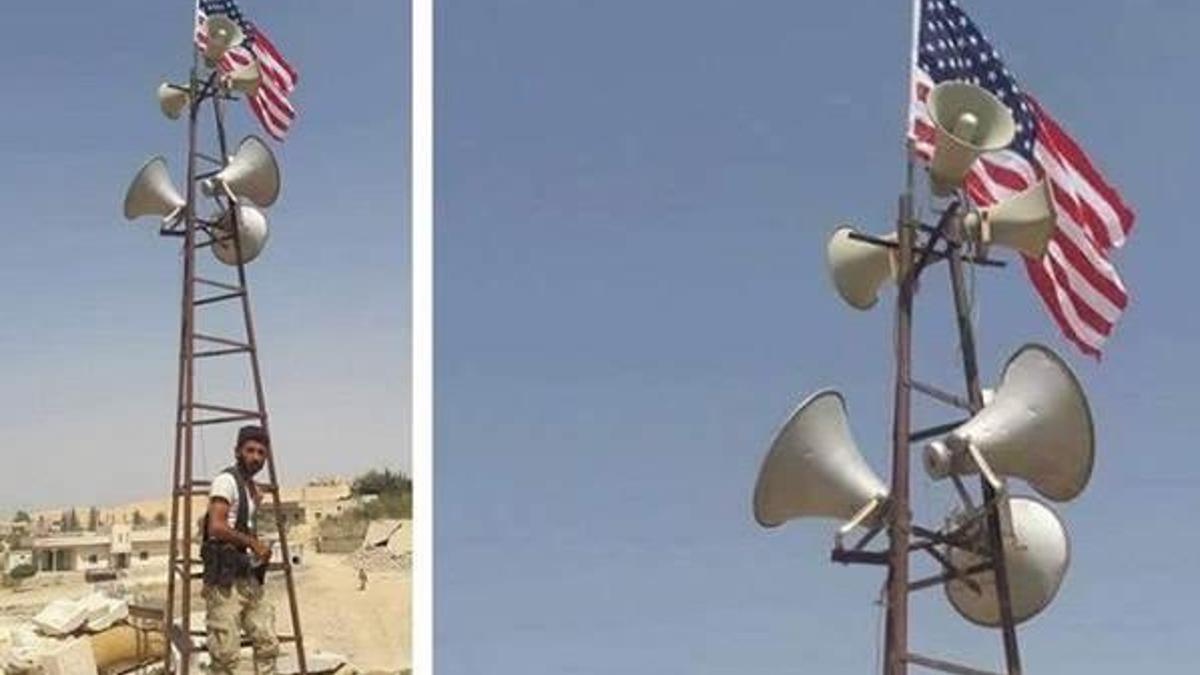 YPG’nin bayrak kalkanı!