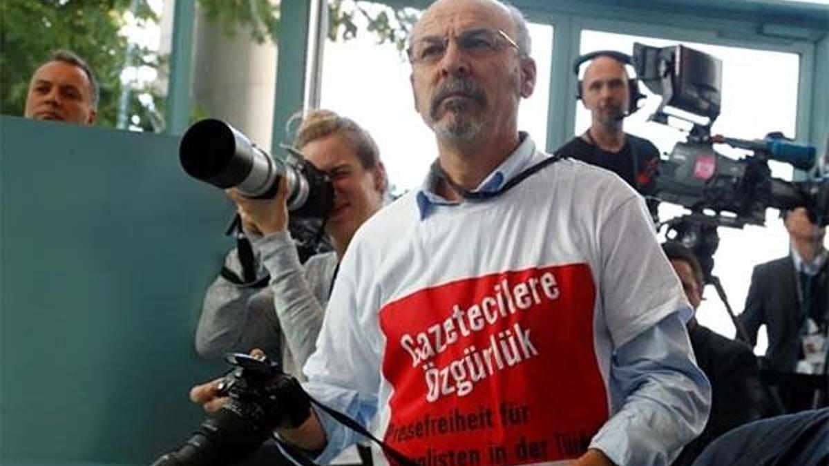 Erdoğan-Merkel basın toplantısından atılmıştı! Kimliği belli oldu