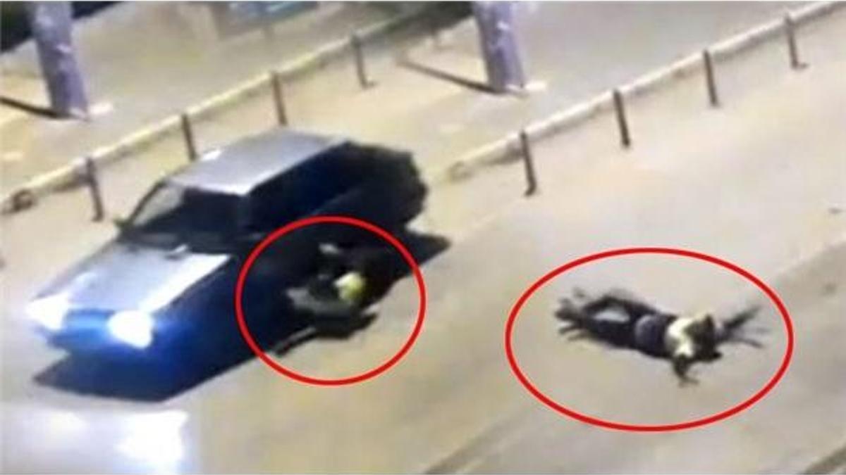 Şoke eden görüntü! Polisi böyle sürükledi!