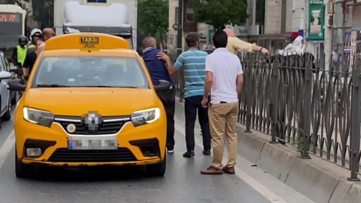 Trafik magandası bijon anahtarı ile dehşet saçtı! Kadın yolcuya aldırmadı
