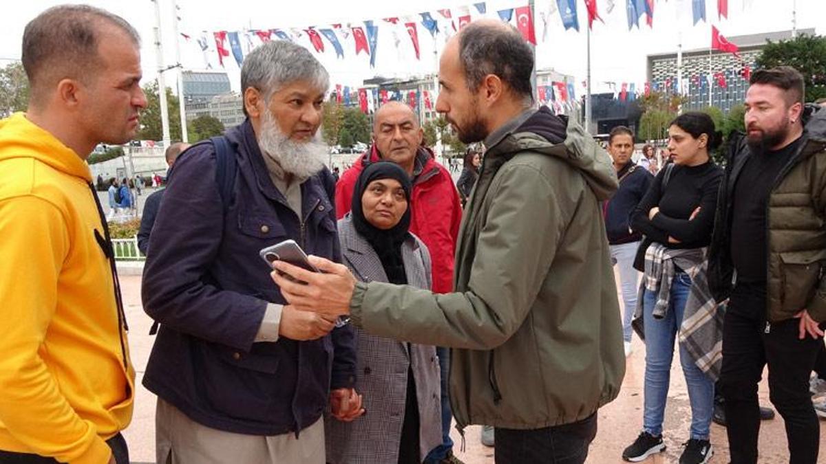 Eşini soymaya çalışan kadını polise teslim etti