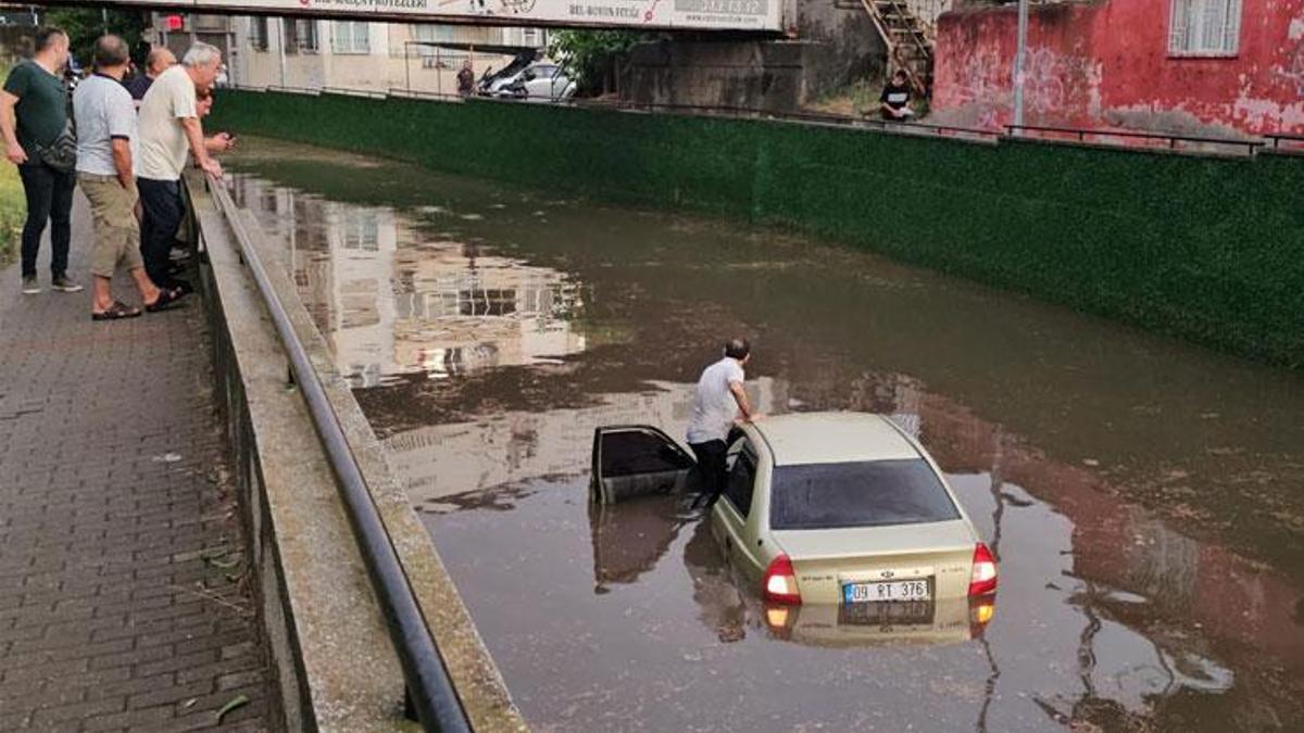 Sağanak hayatı olumsuz etkiledi! Göle dönen alt geçide giren otomobil sulara gömüldü