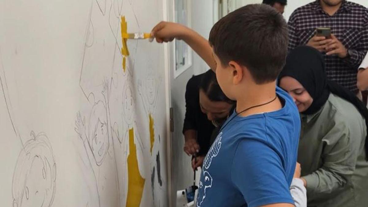 11 yaşındaki otizmli Ömür Kaan engelleri resim ile aşıyor