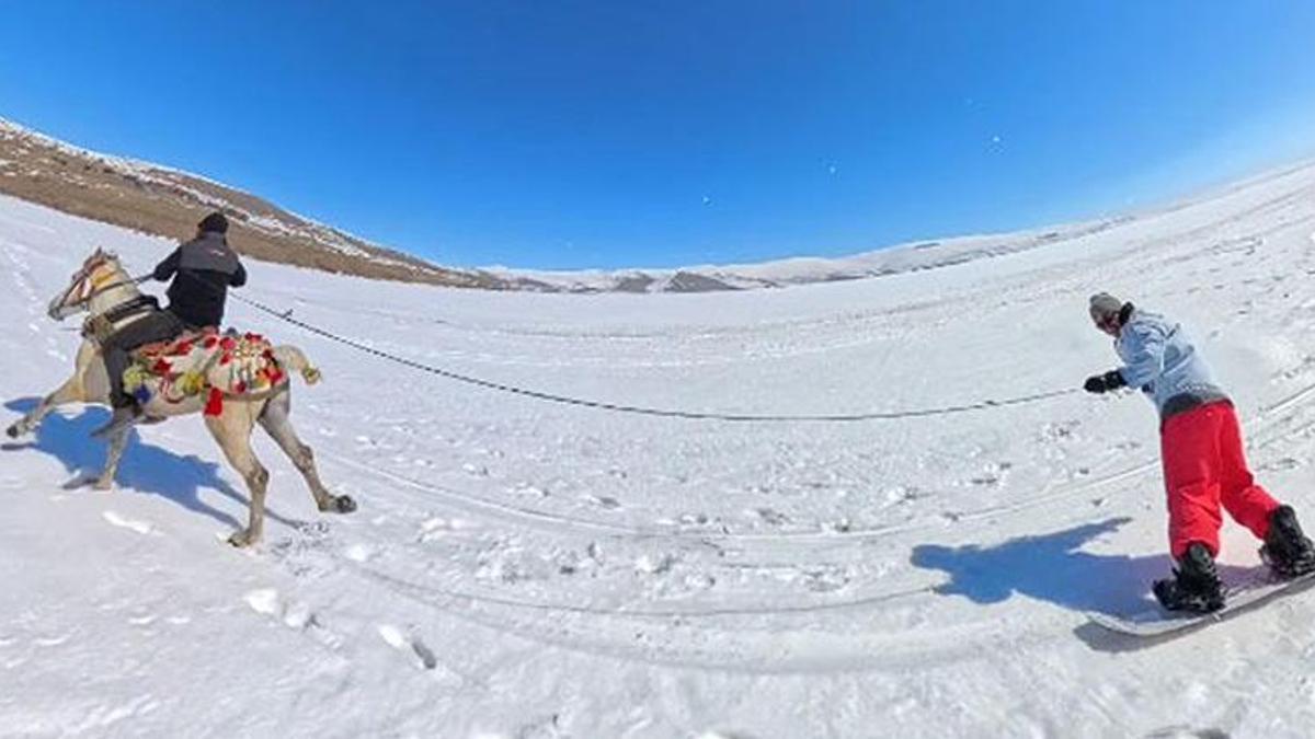 Çıldır Gölü'nde dört nala snowboard keyfi!