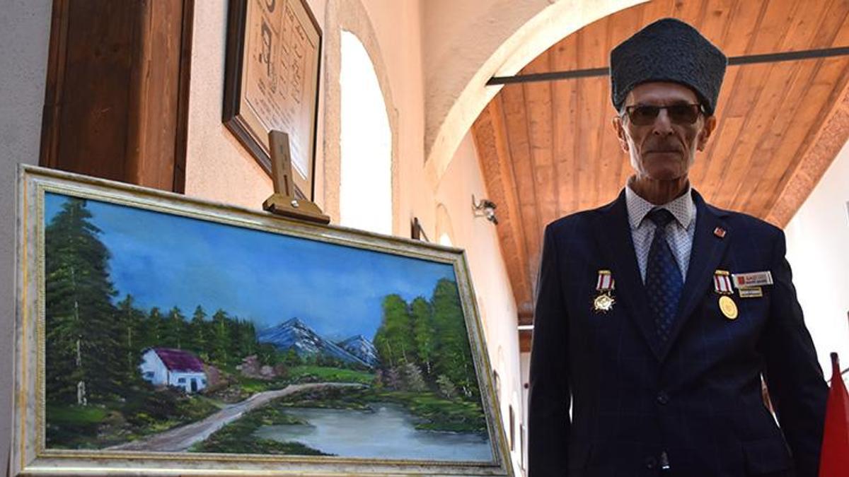 Sivaslı Gazi Bob Ross'a özenerek ressam oldu: İlk sergisini açtı!