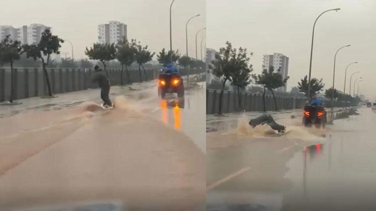 Seyhan’da sağanağın ardından su dolan caddede sörf yaptı