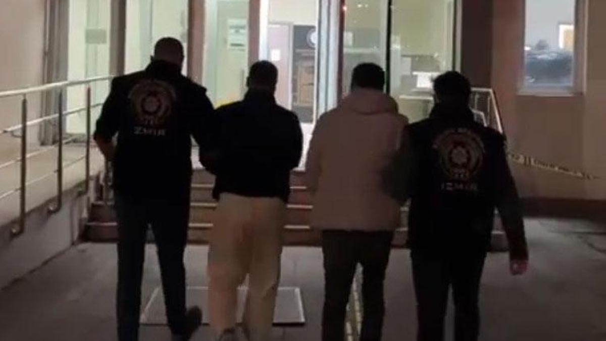 Bornova'da kapıyı 'polisiz' diyerek açtırdılar, silahla vurup 550 bin lira parayı çaldılar