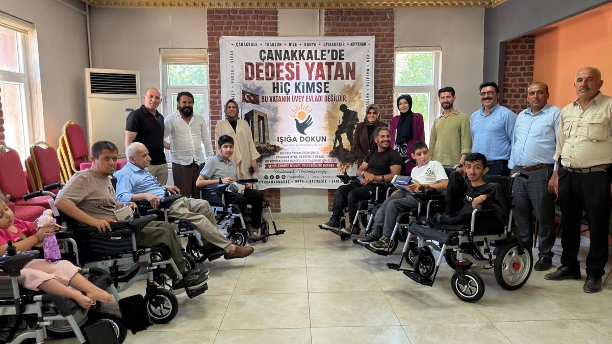 Eruh'ta engellilere elektrikli tekerlekli sandalye desteği
