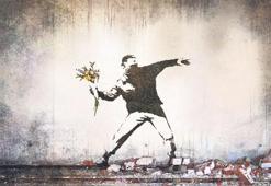 Duvarlar ondan sorulur: Banksy