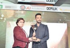 Ödüllendi