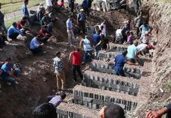 Diyarbakır'da 13 kişi yan yana gömülecek