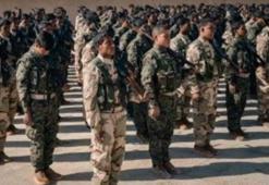 ABD'den bir skandal daha! PKK'ya üniforma giydirdi