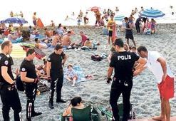 Plajda bira içen iki kadın doktora para cezası