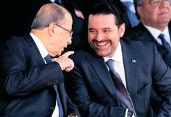 İstifasını askıya aldı