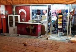 Türk bayrağı asılı marketi yakmak istemişler