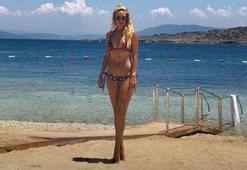 Bikinili pozla hemcinslerine seslendi