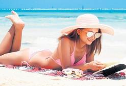 Plajda ne dinlenir ne okunur?