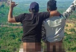 Kutsal kaya önünde çıplak fotoğrafa gözaltı