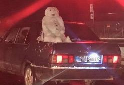 Görenler şaşkına döndü! Kardan adamla seyahat