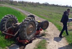 Devrilen traktörün altında kalan sürücü öldü