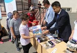 ‘Plastik şişeni getir, tatil kitabını götür’ kampanyası