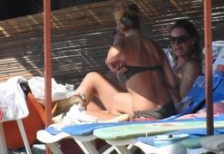 Bikini ile görüntülendiğini fark edince...