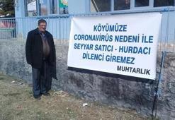 Köyde seyyar satıcı ve dilencilere karşı afişli önlem