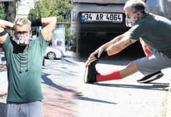 Bin liralık maskeyle kaldırımda spor