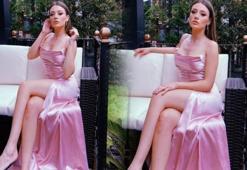 Pembe elbisesiyle beğeni topladı