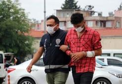 Baskında el konulan kumar parasını geri almak için polisin elini ısırdı