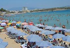 Didim'de plajlar ve havuz başları doldu
