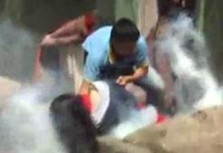 Gaz bombası genç kıza isabet etti
