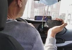 Takside skandal görüntüler! Seyir halindeyken açıp izledi