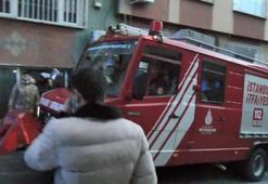 Yangında mahsur kalan bebek ile engelli kadını itfaiye kurtardı
